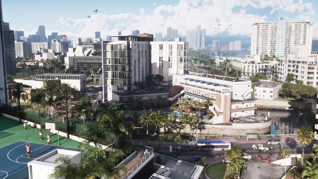 Aerial view of Vice City in GTA 6 showing the Hotel Valetta resort, a basketball court in the foreground and the downtown skyline in the background