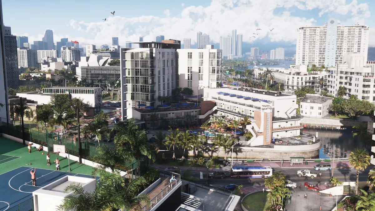 Vedere aeriană asupra orașului Vice City din GTA 6, cu hotelul Valetta, un teren de baschet în prim plan și zgârie norii din fundal