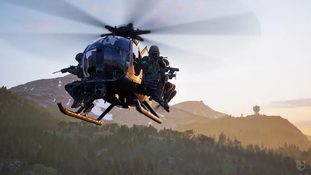 Wardogs MH-6 Littlebird helicopter with two gunners flying over mountains at sunset